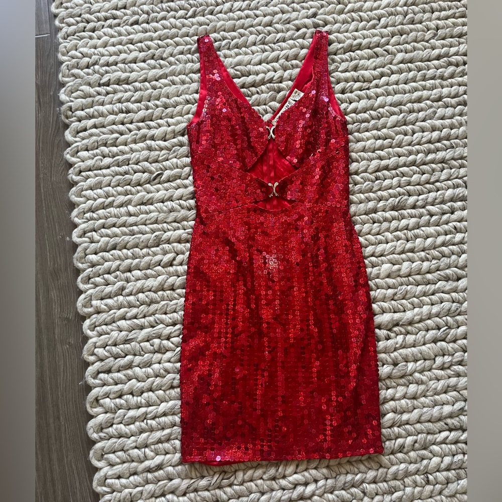Vintage red sequined dress with cut outs - great condition given it’s age.